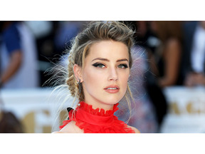 アンバー・ハード、愛犬を不法入国させたことで豪裁判所から召喚状 画像