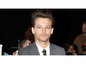 ルイ・トムリンソン、「彼女を守るため」暴力容疑で逮捕 画像